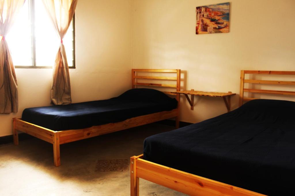 Postel nebo postele na pokoji v ubytování The Retreat Homestay