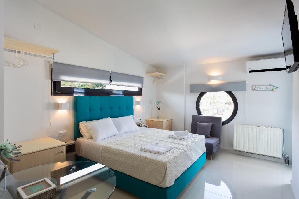Posteľ alebo postele v izbe v ubytovaní Rethymno Hills Apartments