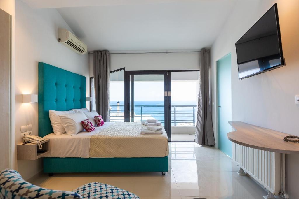 Posteľ alebo postele v izbe v ubytovaní Rethymno Hills Apartments
