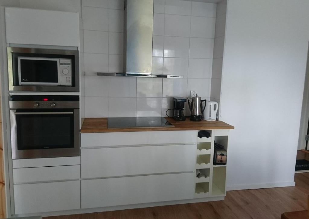 Kuchyň nebo kuchyňský kout v ubytování Nytorpsgården