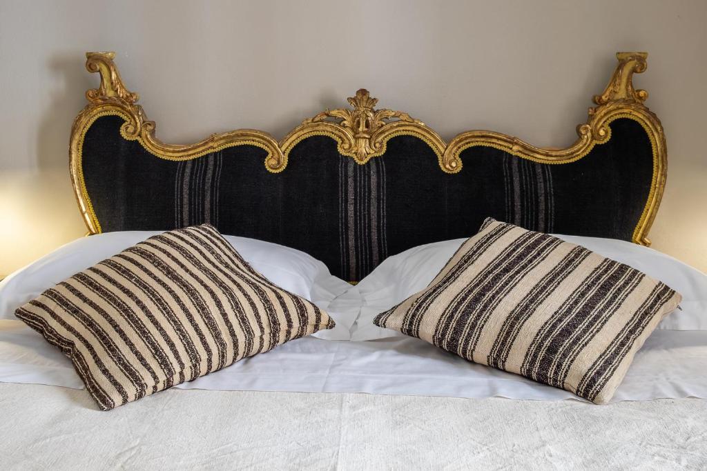 Cama o camas de una habitación en Casatorre dei Leoni Dimora Storica
