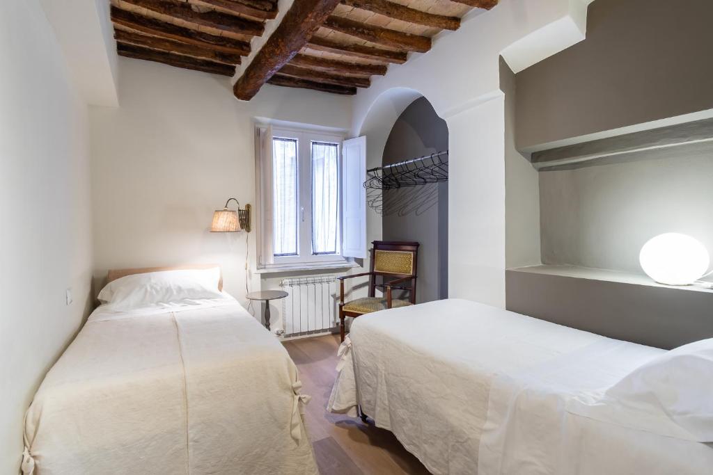 Cama o camas de una habitación en Casatorre dei Leoni Dimora Storica