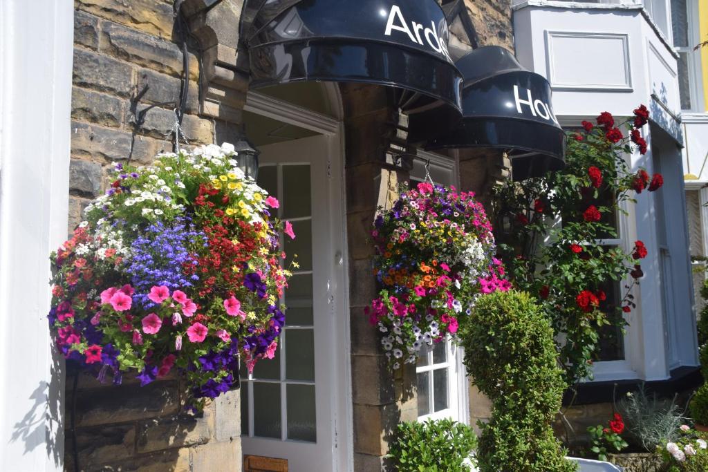 a house with flowers on the front of it at Arden House in Harrogate