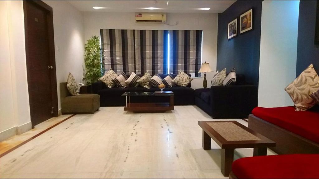 Posezení v ubytování Tatvam Residency