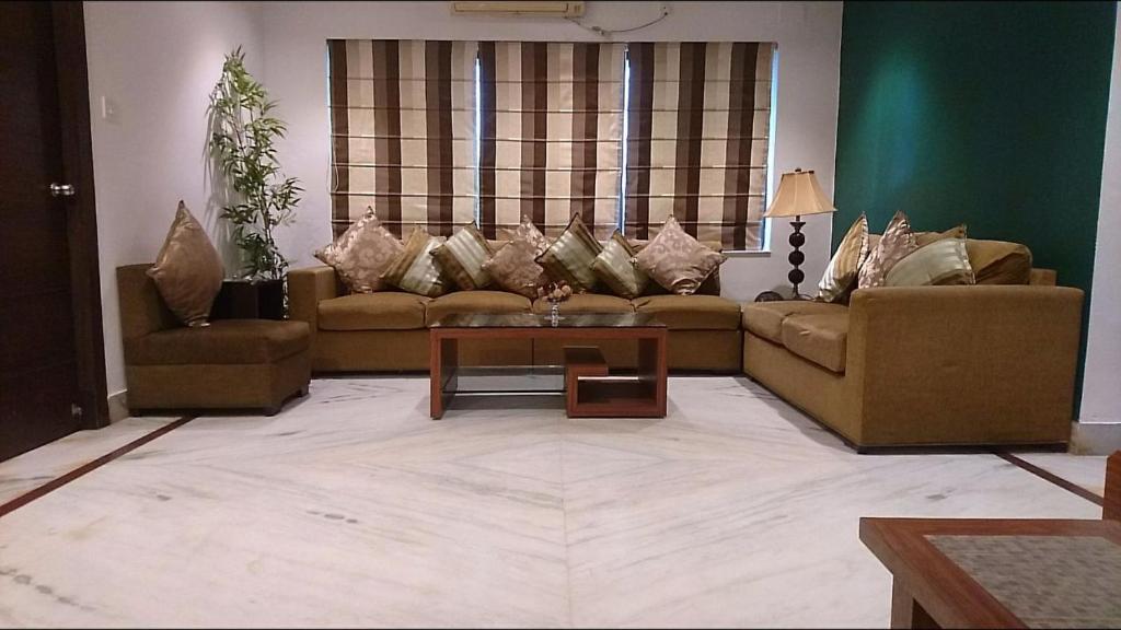 Posezení v ubytování Tatvam Residency
