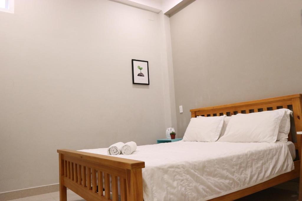 Postel nebo postele na pokoji v ubytování Long Hostel