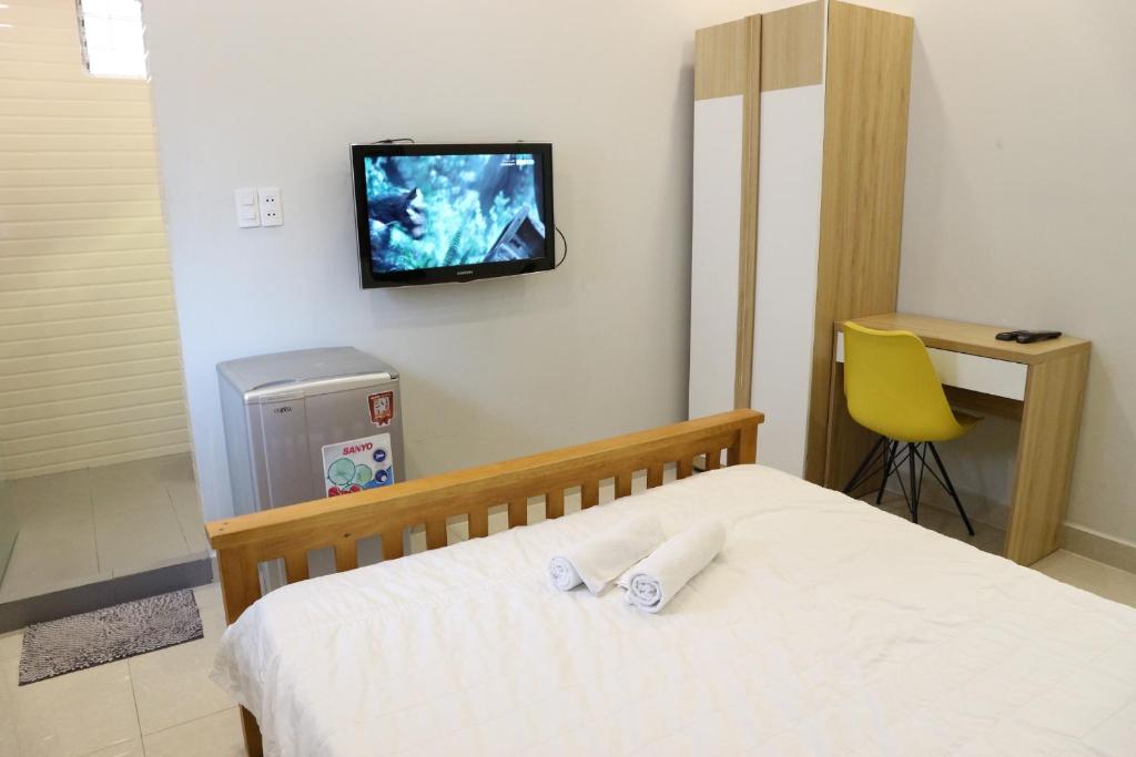 Postel nebo postele na pokoji v ubytování Long Hostel