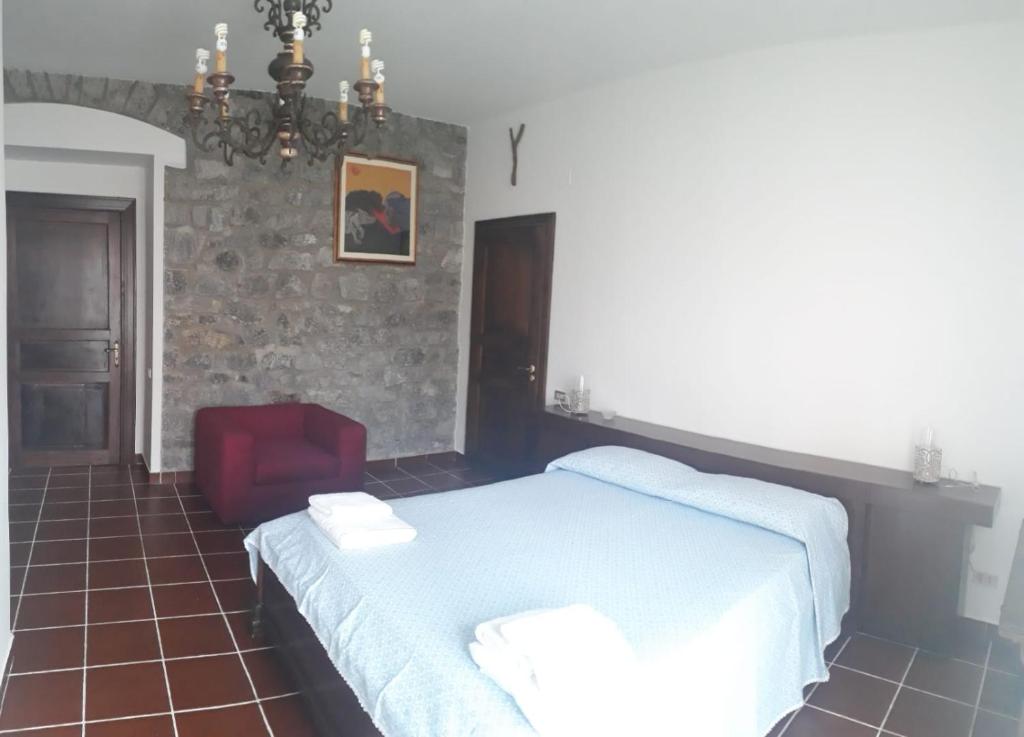 Postel nebo postele na pokoji v ubytování b&b Oikos