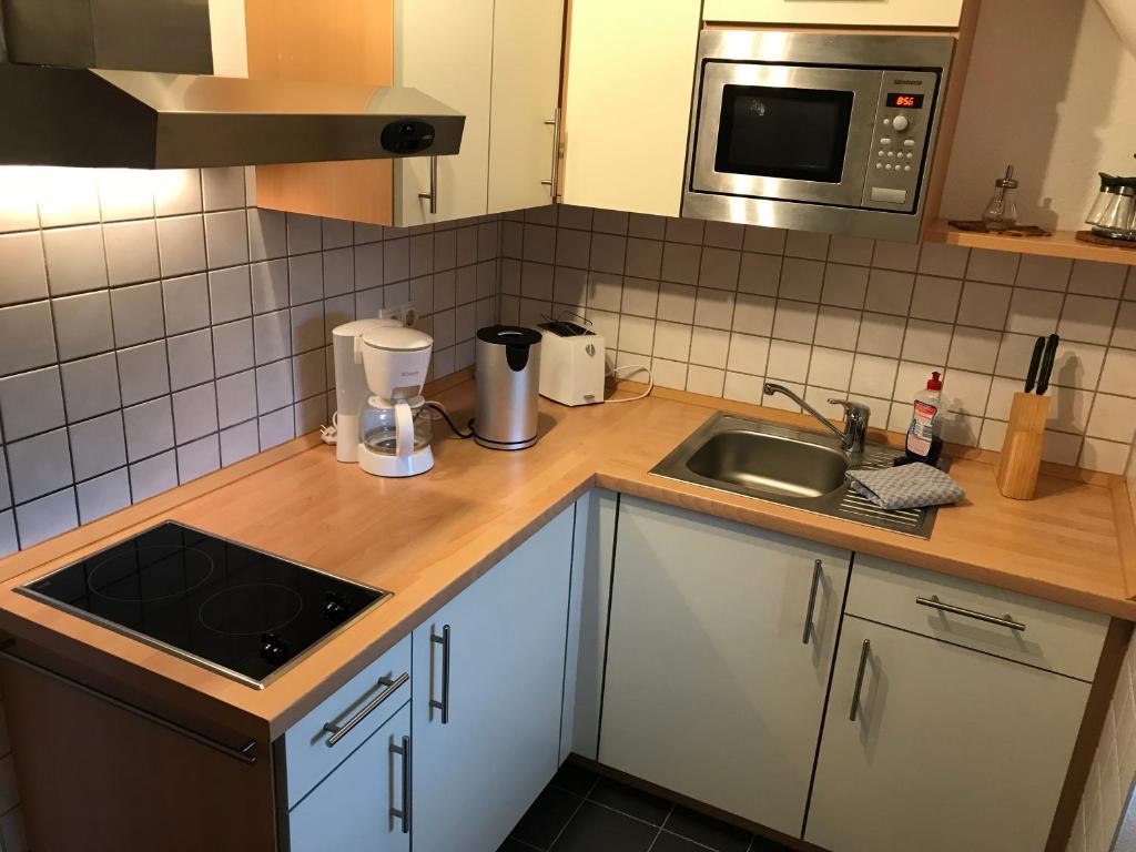 Kuchyň nebo kuchyňský kout v ubytování Berggasthof Heuberghaus, direkt am Rennsteig