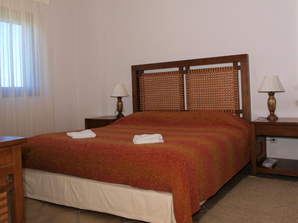 Postel nebo postele na pokoji v ubytování Hotel Theasi