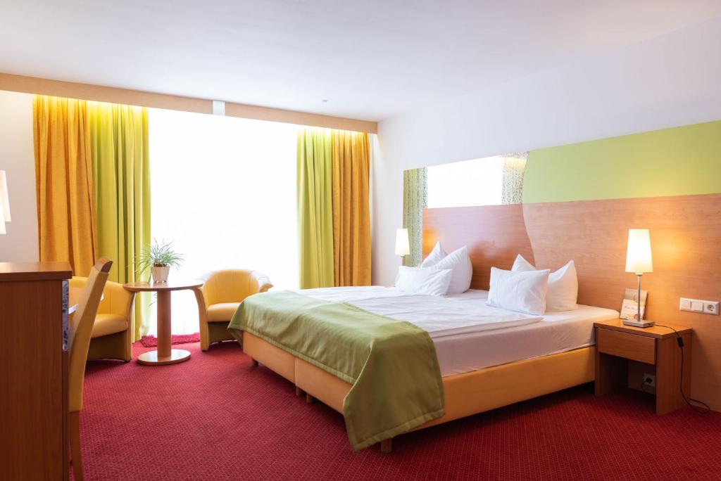 Postel nebo postele na pokoji v ubytování Central Boutique Hotel