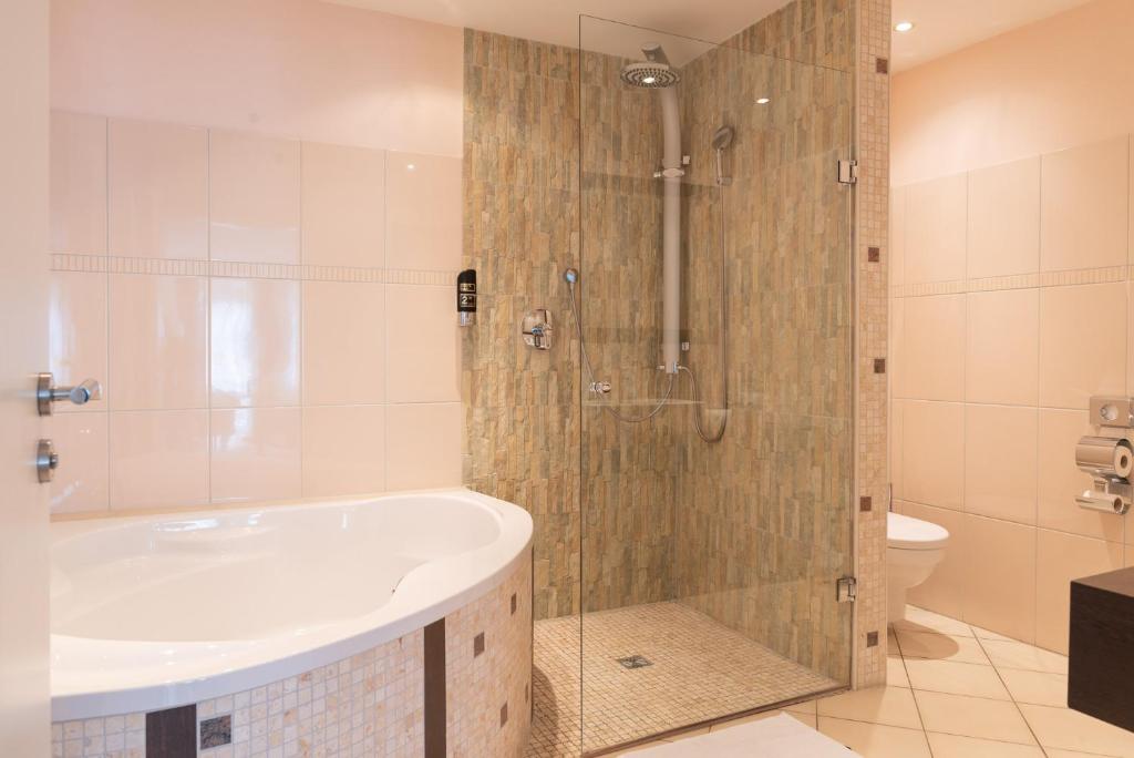 Koupelna v ubytování Central Boutique Hotel