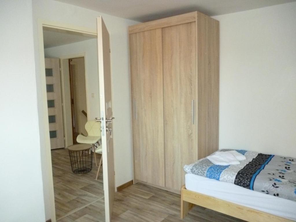 Posteľ alebo postele v izbe v ubytovaní Apartmán Relax-chatka a apartmán
