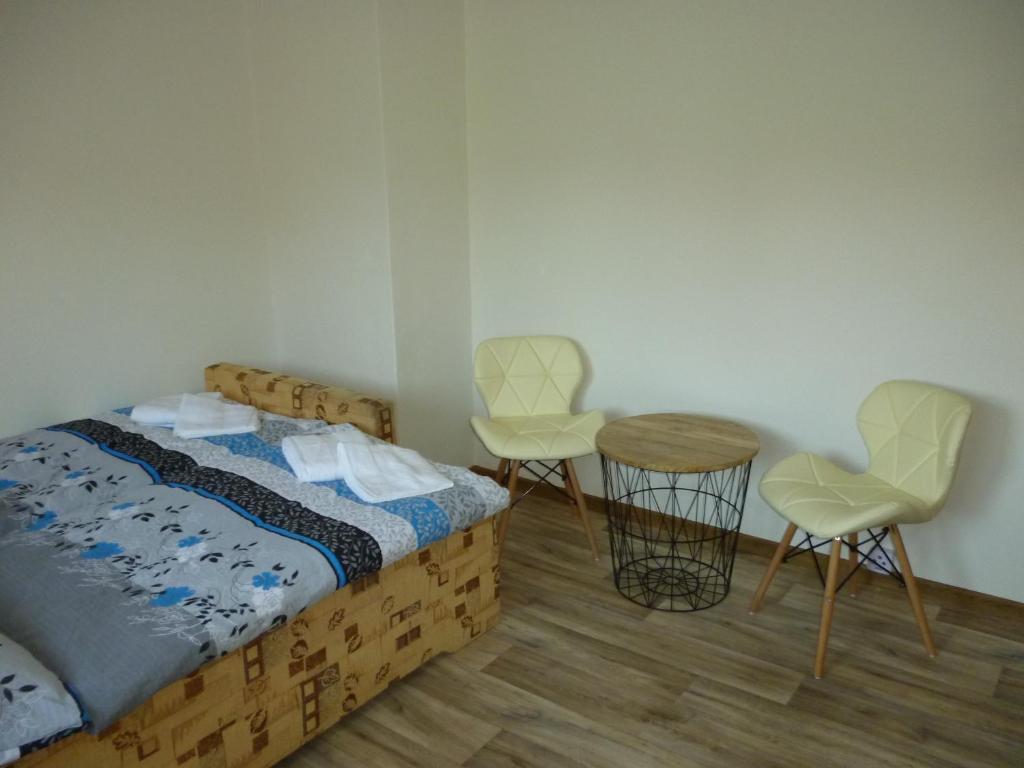 Posteľ alebo postele v izbe v ubytovaní Apartmán Relax-chatka a apartmán