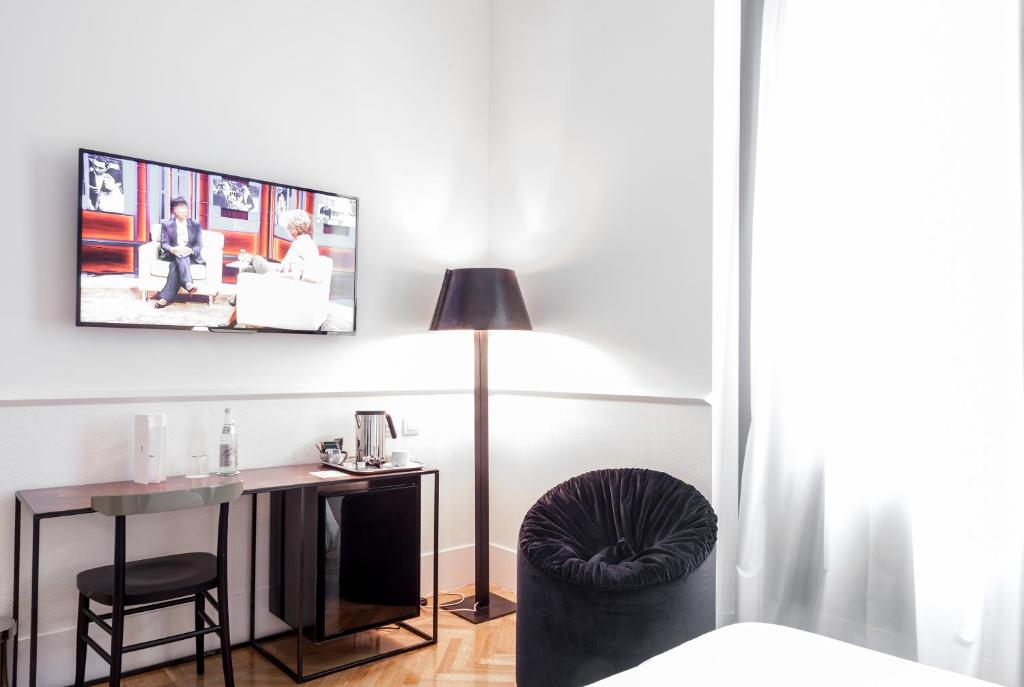 TV a/nebo společenská místnost v ubytování Senato Hotel Milano