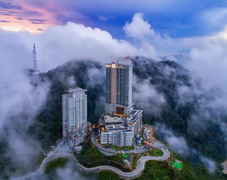 an aerial view of a city in the clouds at Grand Ion Delemen Hotel in Genting Highlands