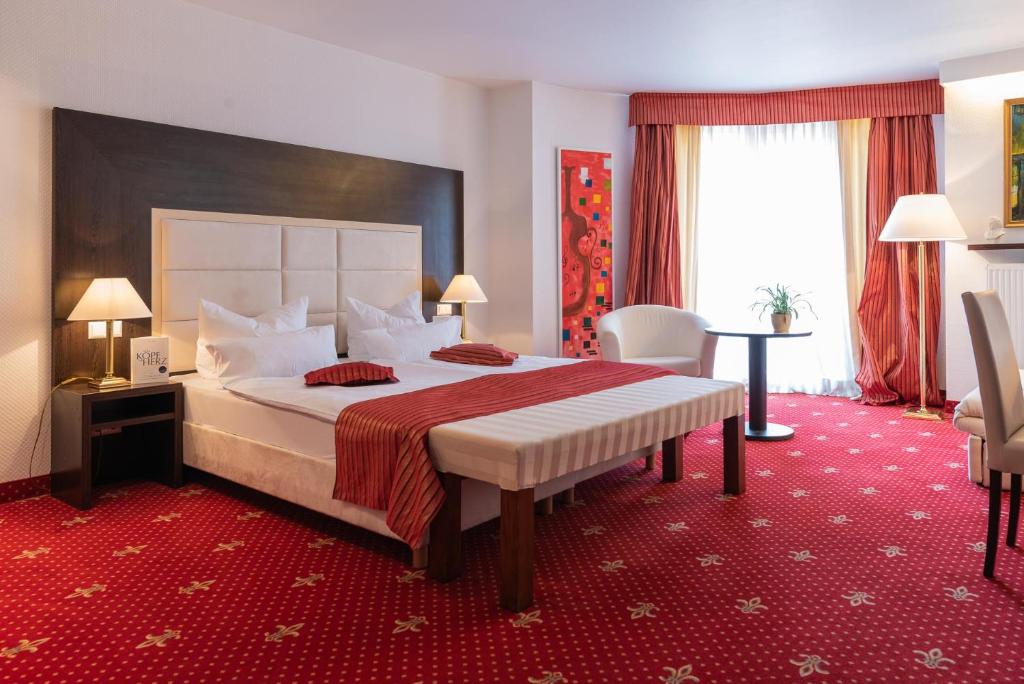Postel nebo postele na pokoji v ubytování Central Boutique Hotel