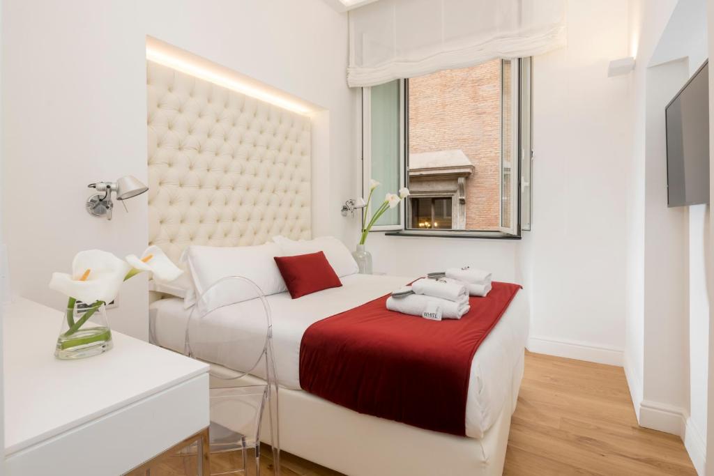 Postel nebo postele na pokoji v ubytování Hotel Navona