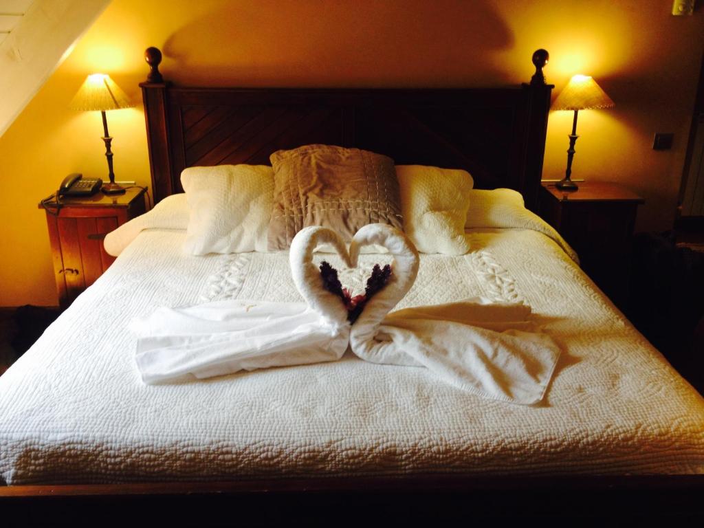 Postel nebo postele na pokoji v ubytování Hotel & Spa Casa Irene