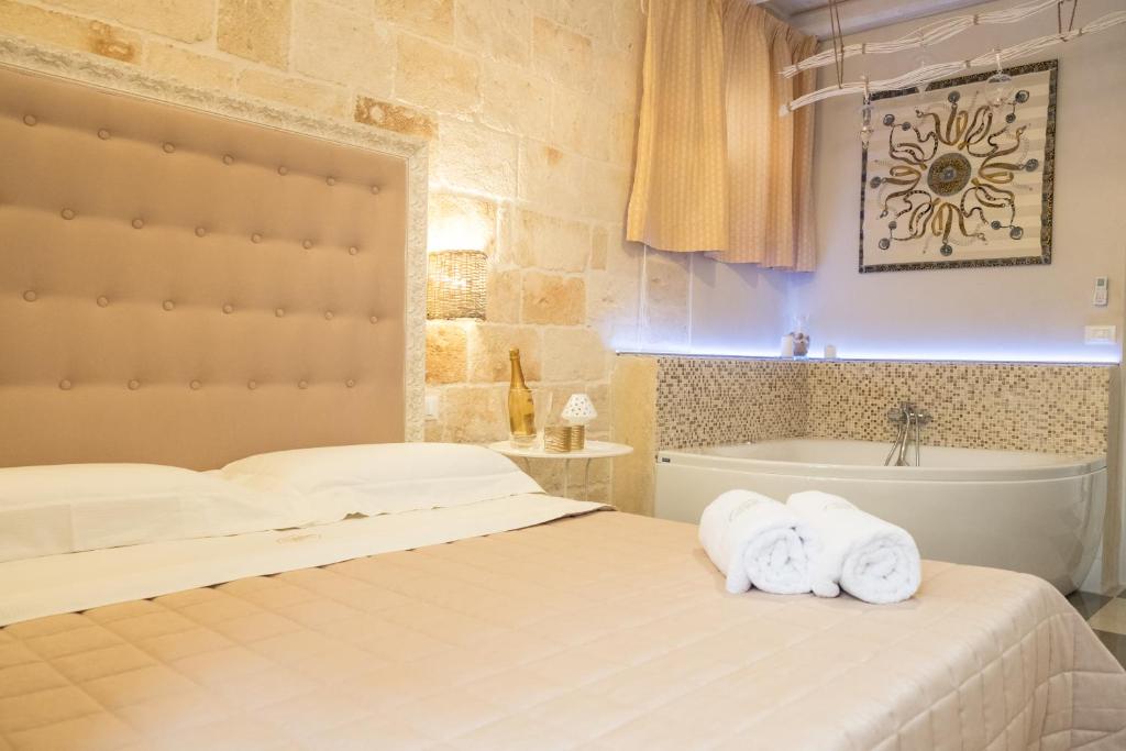 Postel nebo postele na pokoji v ubytování HolidayMonopoli