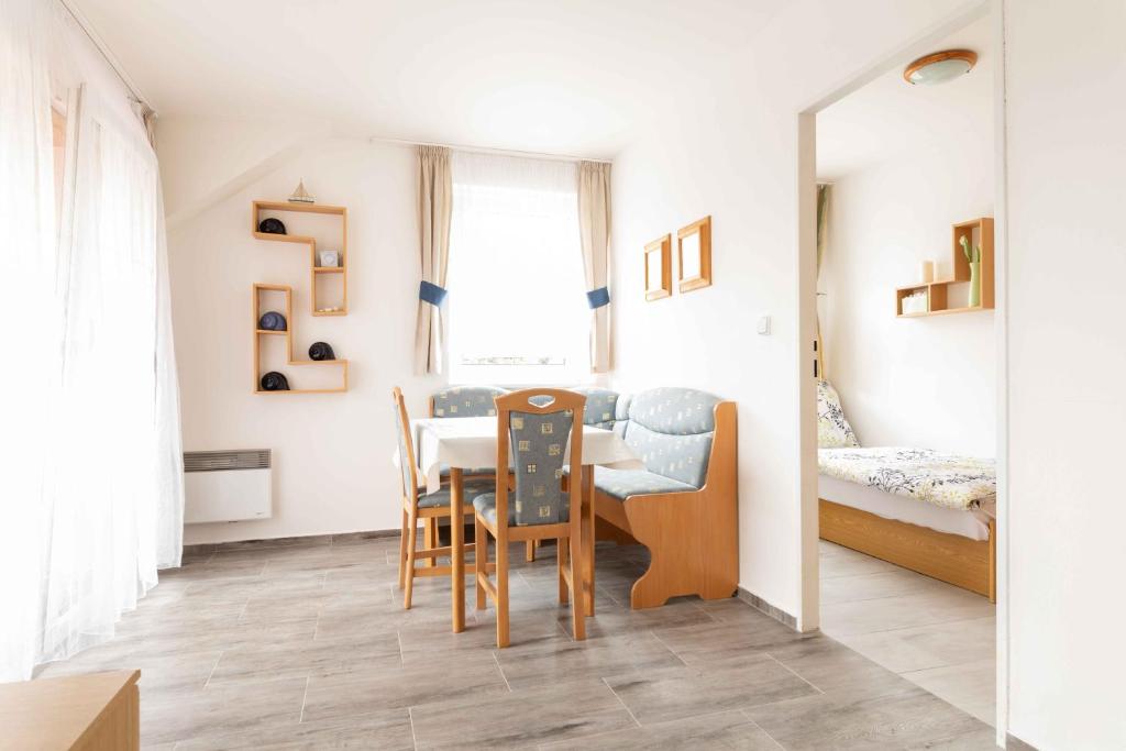 Postel nebo postele na pokoji v ubytování Apartmány Sen