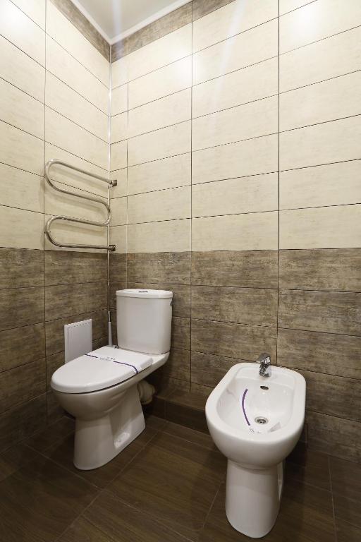 Koupelna v ubytování Oberig Hotel