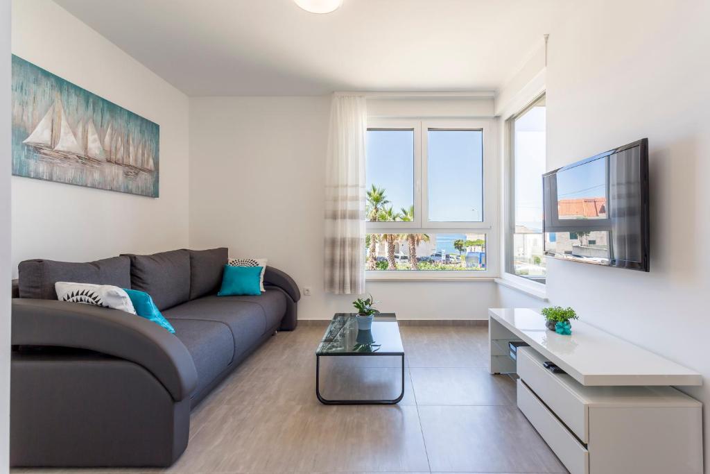 TV a/nebo společenská místnost v ubytování Apartments Villa 19