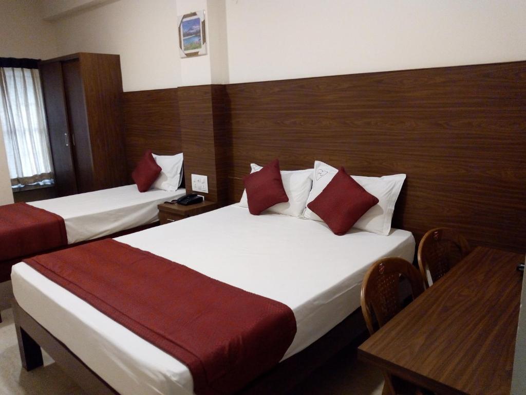 Postel nebo postele na pokoji v ubytování Hotel Lovely Nest