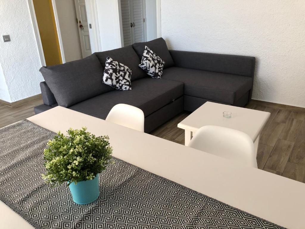 Posedenie v ubytovaní Apartamentos AR Muntanya Mar