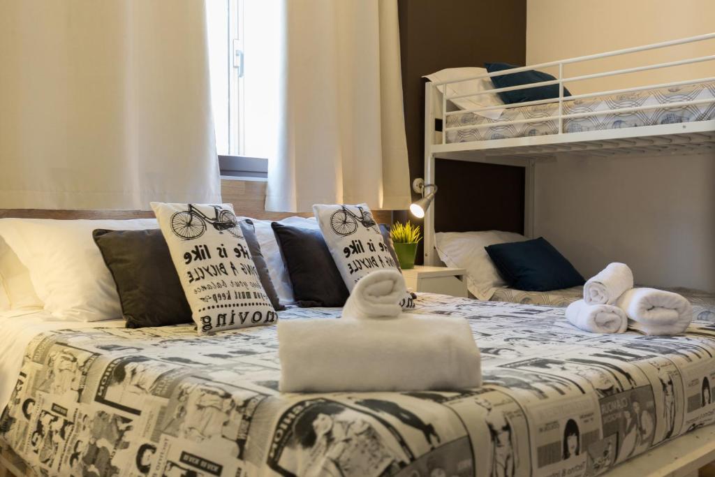 A bed or beds in a room at B&B Miro Centro Catania