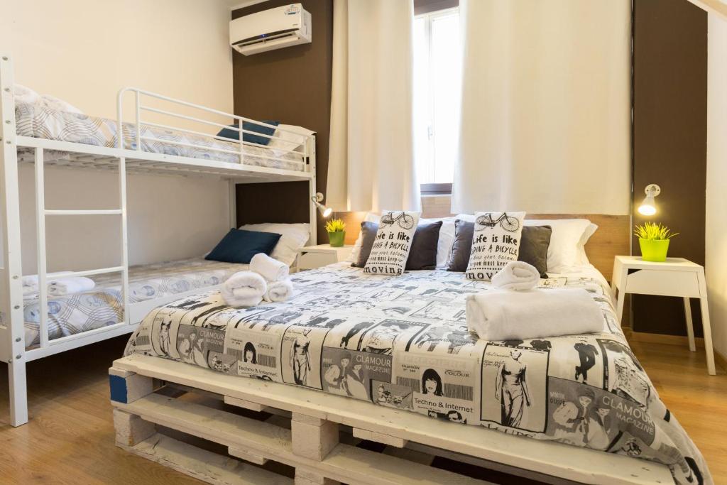 A bed or beds in a room at B&B Miro Centro Catania