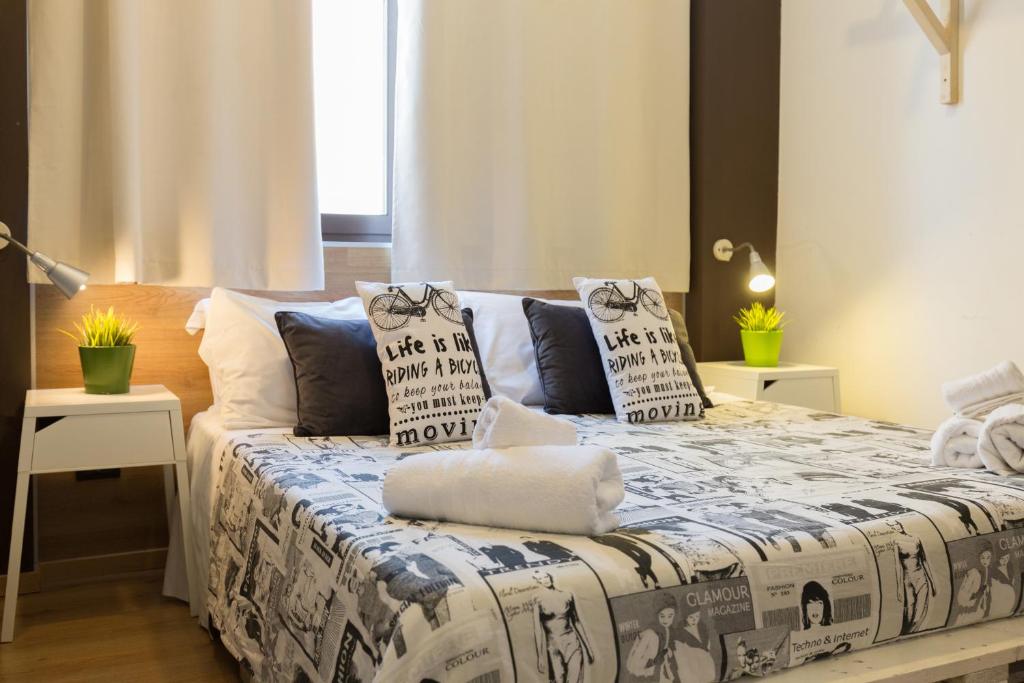 A bed or beds in a room at B&B Miro Centro Catania