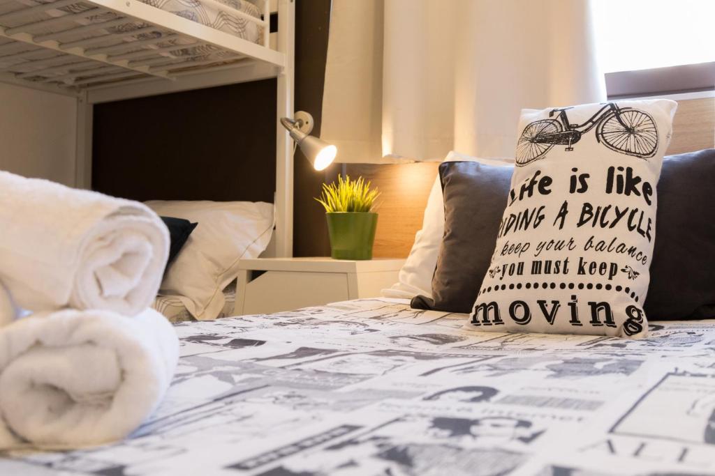 A bed or beds in a room at B&B Miro Centro Catania