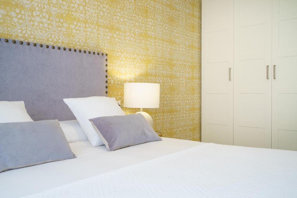 A bed or beds in a room at iloftmalaga Verdaguer