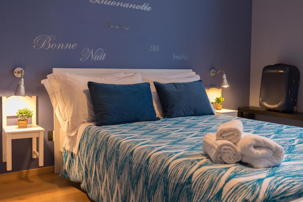 A bed or beds in a room at B&B Miro Centro Catania