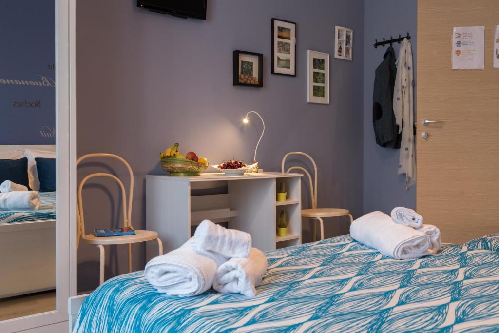 A bed or beds in a room at B&B Miro Centro Catania