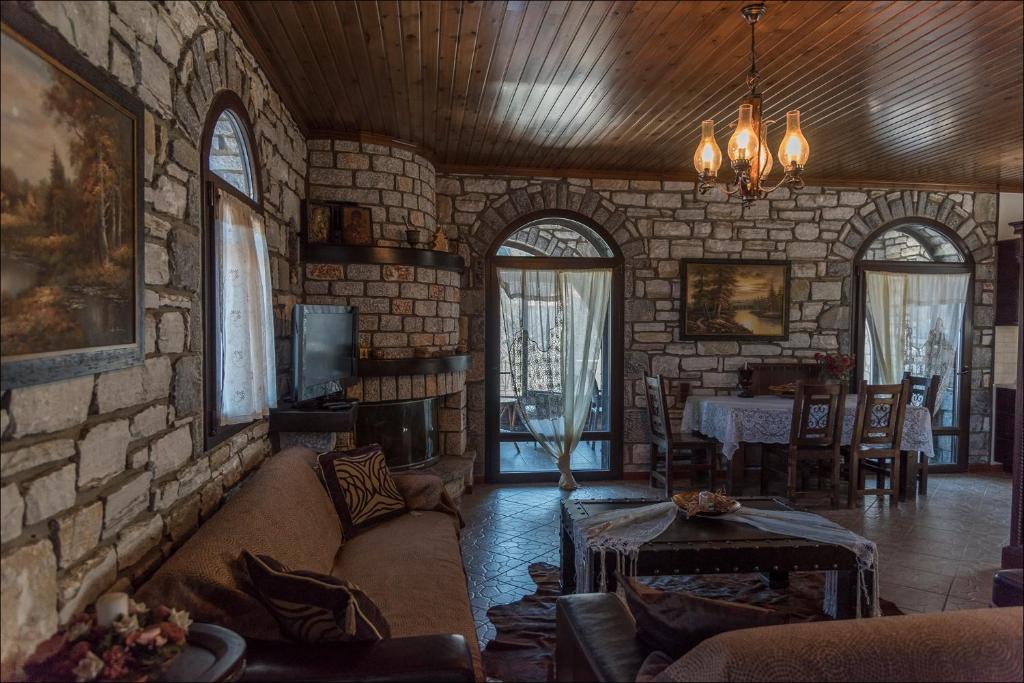 Posezení v ubytování Stone Mansion Anavryti, ΑΜΑ 20569