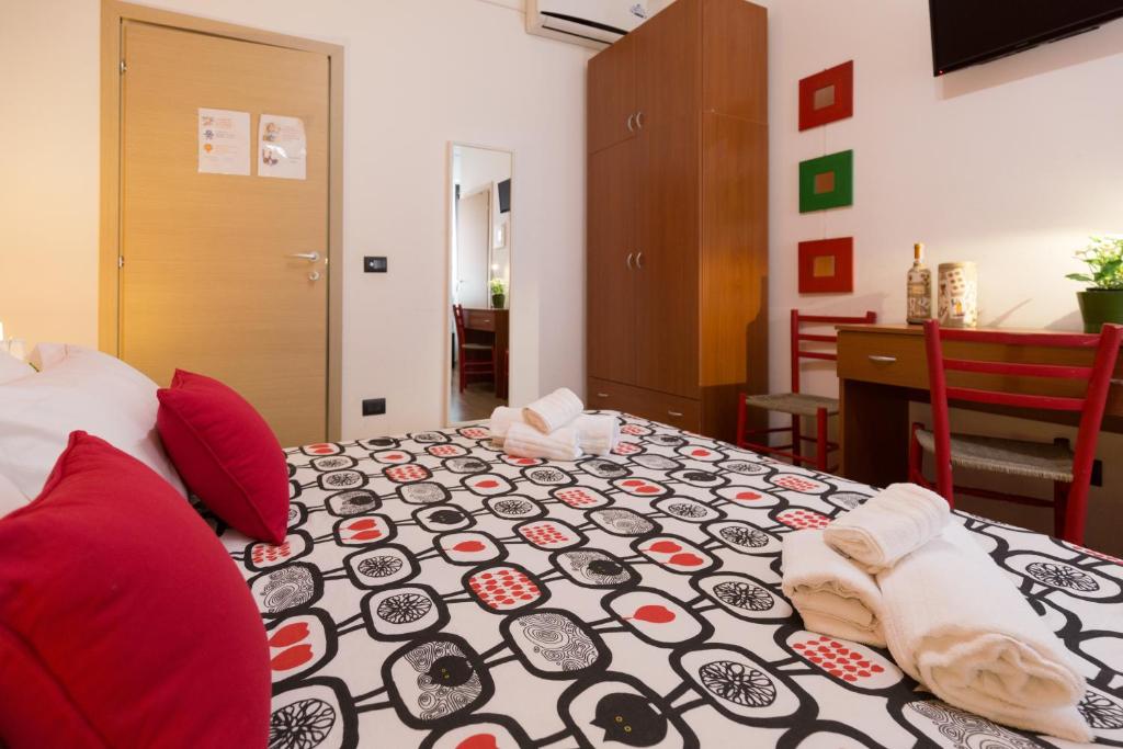 A bed or beds in a room at B&B Miro Centro Catania