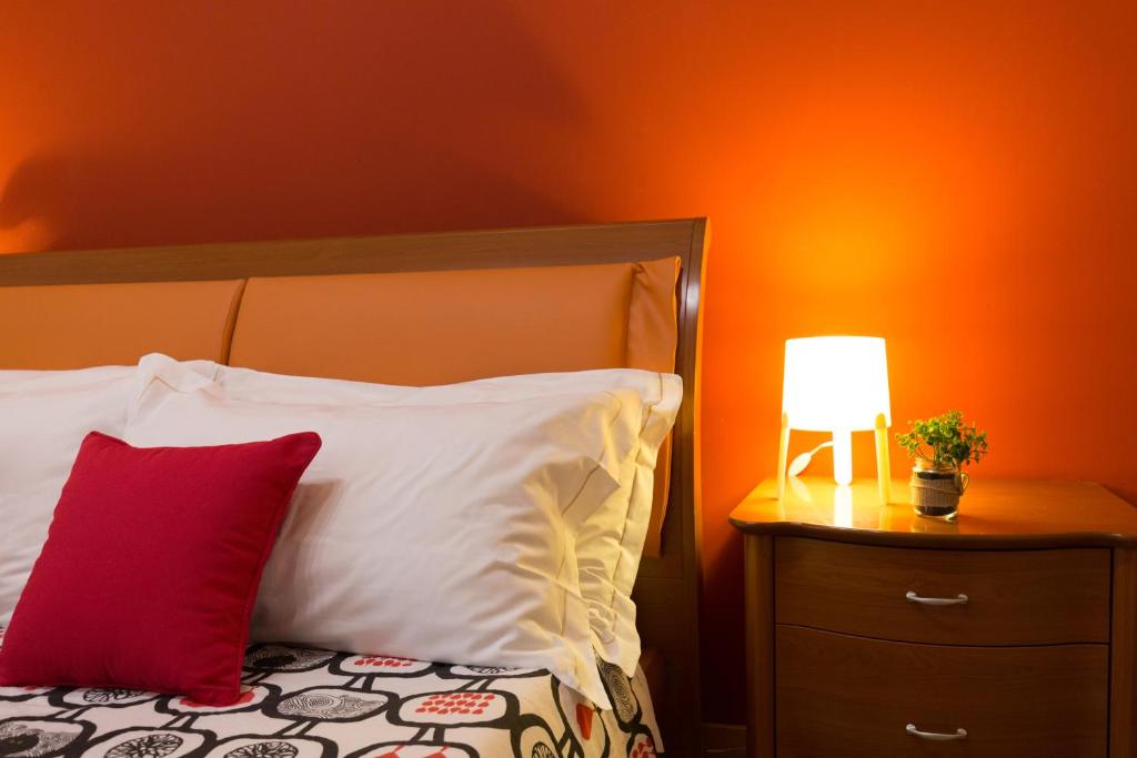 A bed or beds in a room at B&B Miro Centro Catania