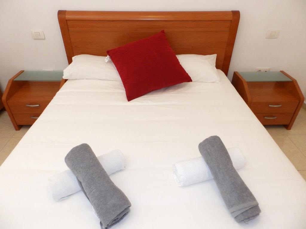 Postel nebo postele na pokoji v ubytování Apartamentos Medano - La Ladera
