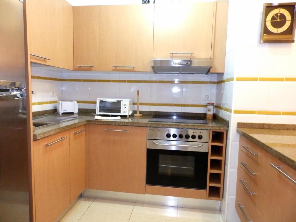 Kuchyň nebo kuchyňský kout v ubytování Apartamentos Medano - La Ladera