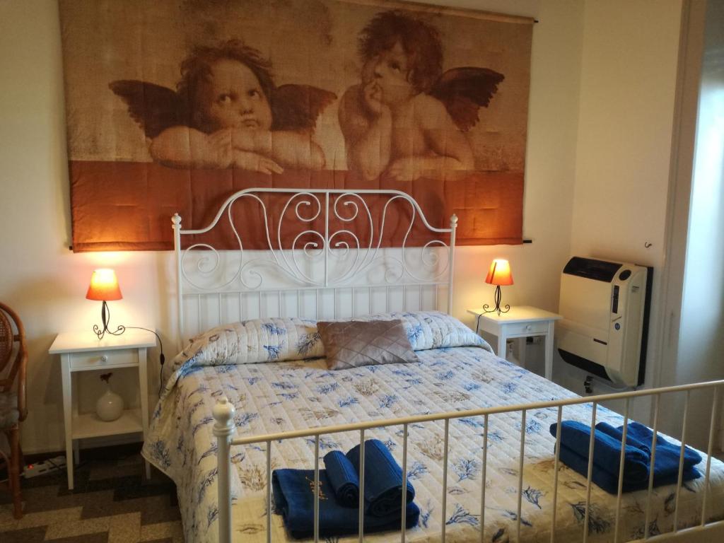 Postel nebo postele na pokoji v ubytování Aretè Guest House
