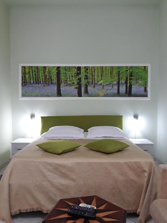 Llit o llits en una habitació de Hotel Kaduku