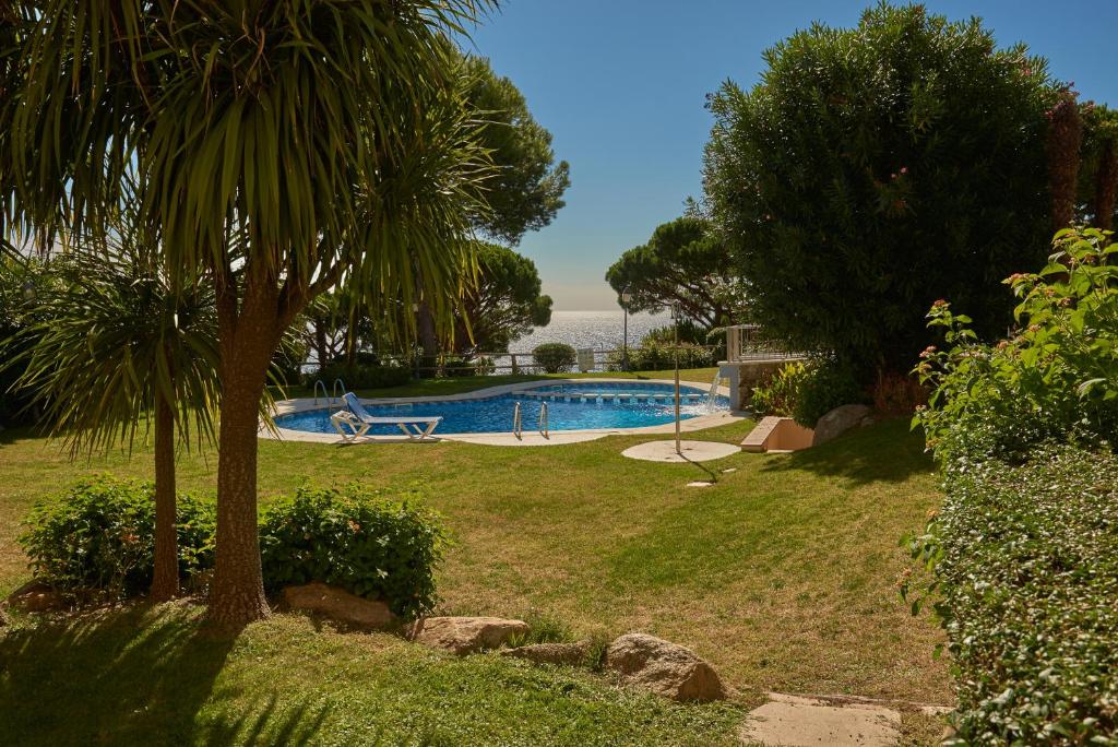 בריכת השחייה שנמצאת ב-Residence Velas Garden Pool Suite או באזור