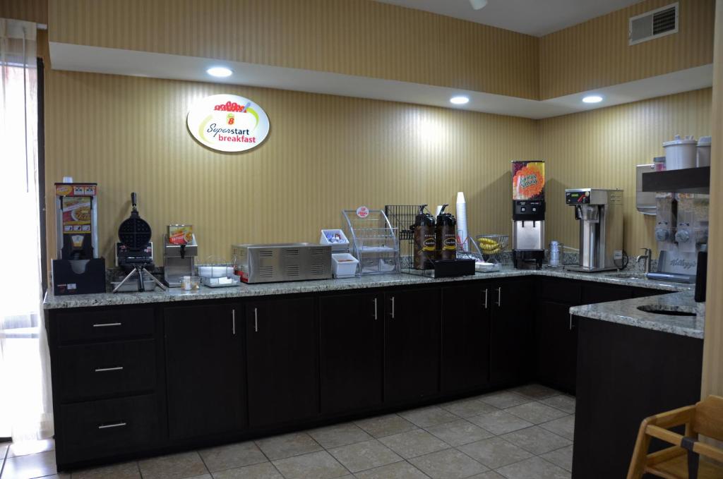 a kitchen with a counter top with a coffee maker at Super 8 by Wyndham Franklin Hwy 31 in Franklin