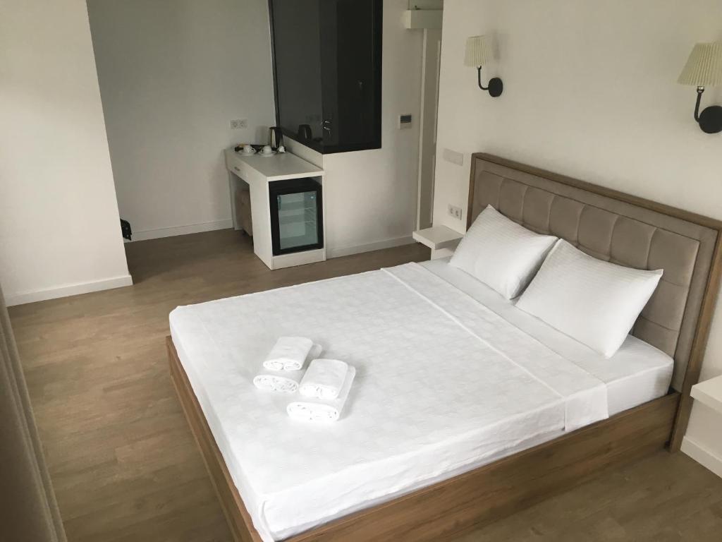 Postel nebo postele na pokoji v ubytování Gala Selimiye