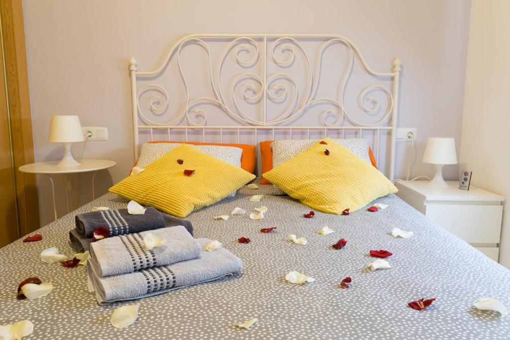 Posteľ alebo postele v izbe v ubytovaní MALAMA Apartamentos Turísticos