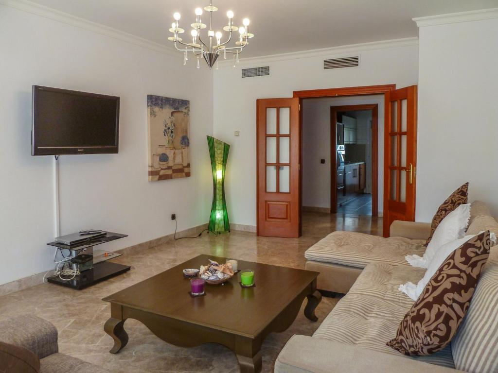 Zona de estar de Cozy apartment in Los Cristianos