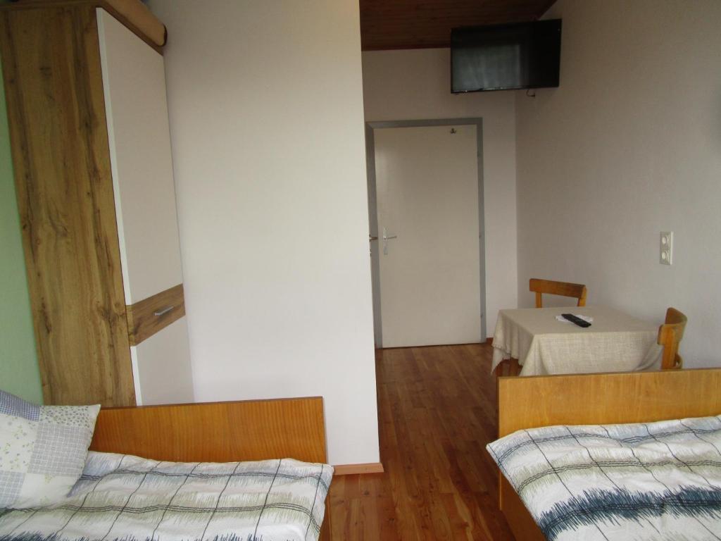 Postel nebo postele na pokoji v ubytování Dorfwirtshaus Rauch