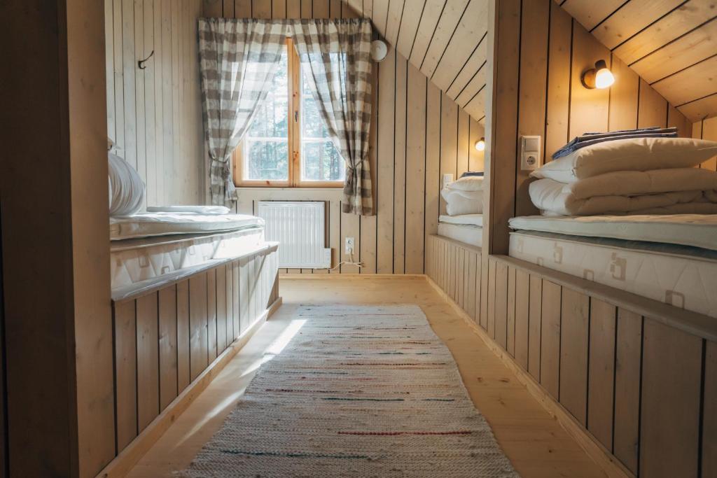 Postel nebo postele na pokoji v ubytování Peipsi Homestay